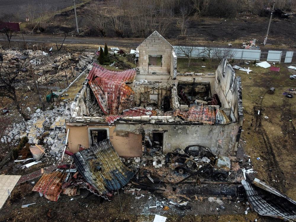 This aerial view taken near Kyiv on Wednesday shows a destroyed house in the village of Lukianivka.