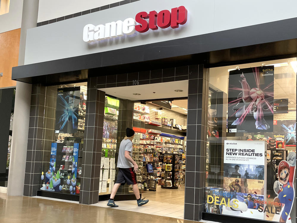 A customer enters a GameStop store on Dec. 8, 2021.