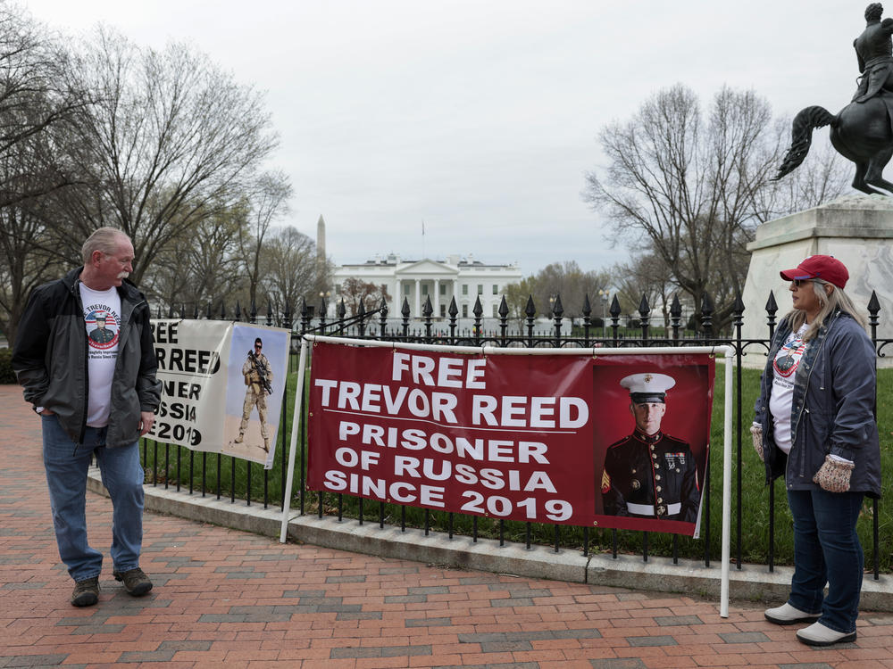 Joey and Paula Reed protest in Lafayette Park near the White House on Wednesday in Washington, D.C. Their son, Trevor Reed, just started a second hunger strike to protest his treatment in a Russian prison.