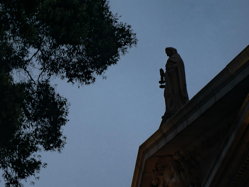 The Lady Justice statue stands atop the Final Court of Appeal in Hong Kong after a ceremony to mark the opening of the legal year on Jan. 24, 2022 in Hong Kong.