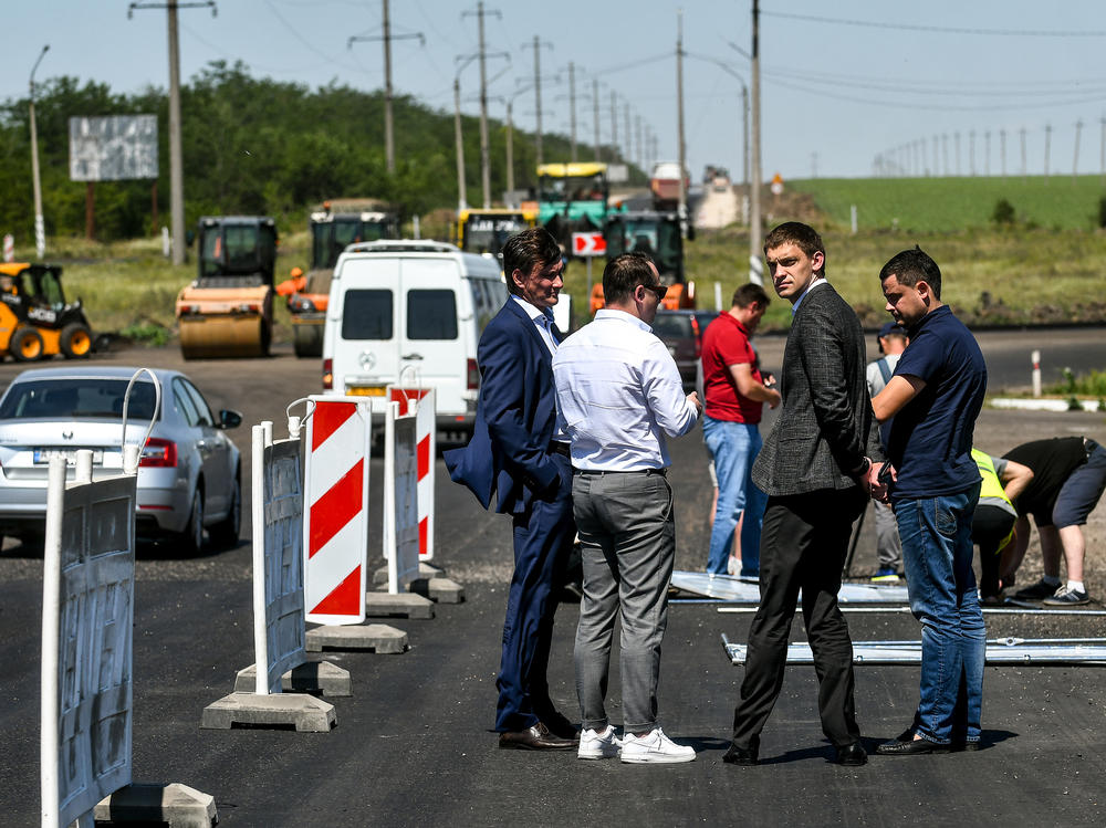 Ivan Fedorov (third from left), then first deputy head of the Zaporizhzhia Regional State Administration, attends a meeting on road repairs in southeastern Ukraine in 2020. Fedorov, now the mayor of Melitopol, was abducted by Russian forces earlier this month and later freed.