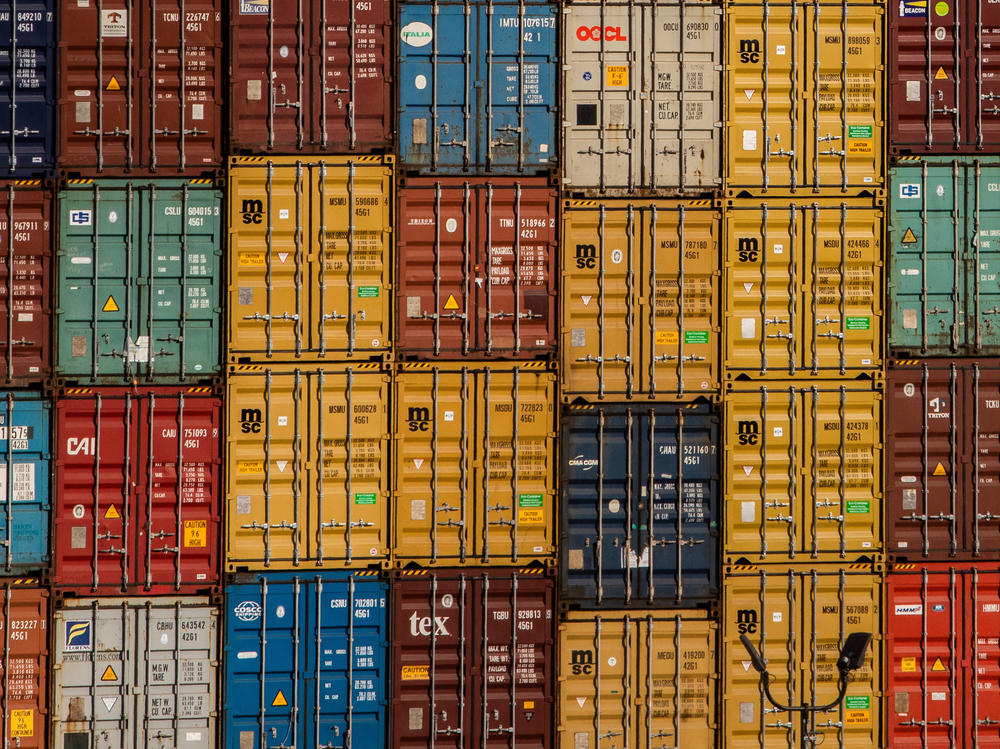 Shipping containers are stacked at the Port of Long Beach in Long Beach, Calif., on Nov. 17, 2021. Congestion at U.S. ports has caused supply chain disruptions, driving up prices and leading to a growing shortage of goods.