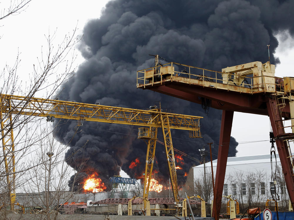 Damage is seen after what Russia says was a Ukrainian Army attack on an oil refinery in Belgorod, Russia, on Friday.