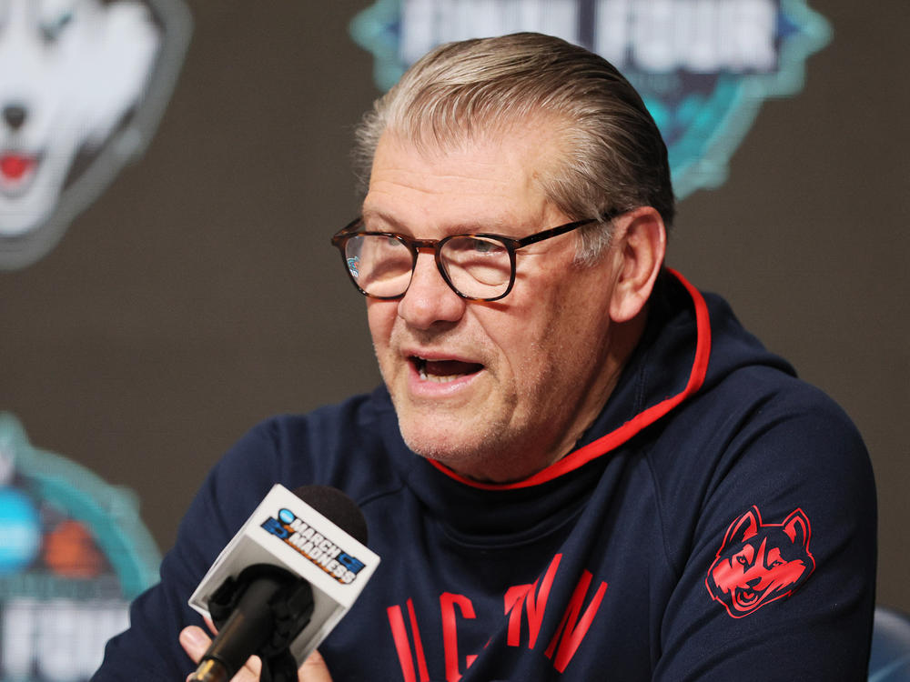 Head coach Geno Auriemma of the UConn Huskies speaks to reporters before a practice session with the team at Target Center on March 31, 2022 in Minneapolis, Minnesota.