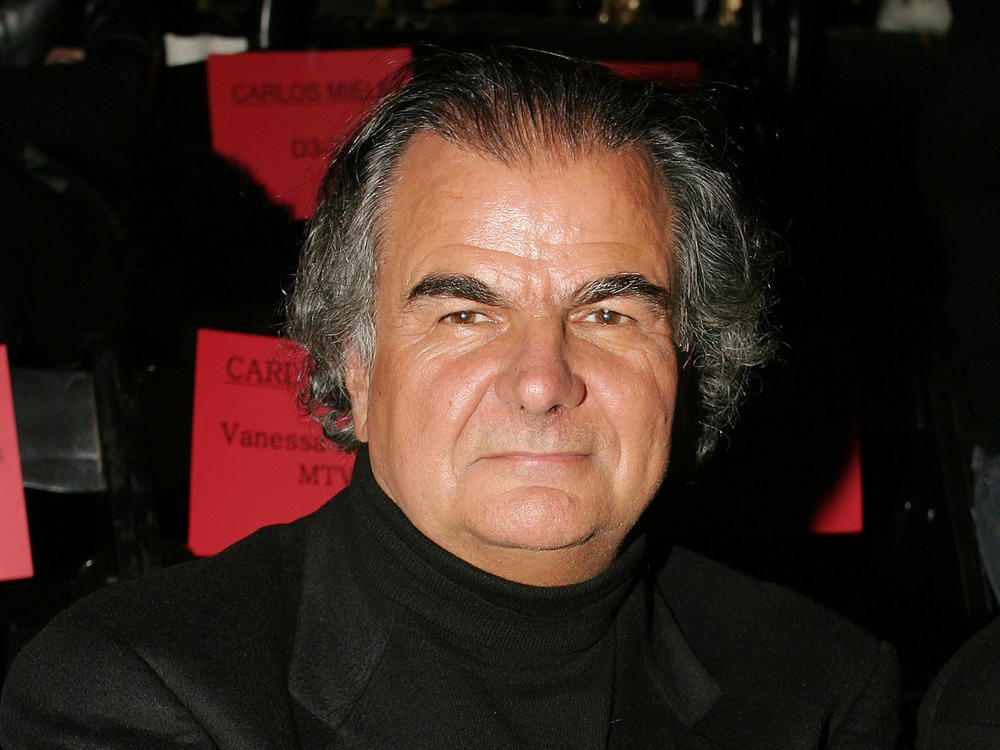 Photographer Patrick Demarchelier is seen at a fashion show in New York in 2004.