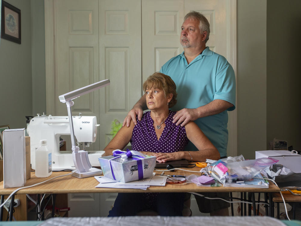 Suzanne and Jim Rybak, inside the craft room where their son, Jameson, would encourage Suzanne to make colorful beach bags, received a $4,928 medical bill months after it was supposedly resolved.