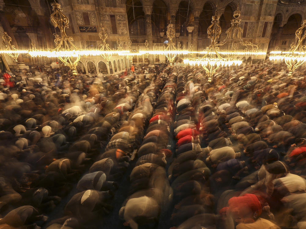 <strong>Istanbul, Turkey:</strong> Muslim worshippers perform a night prayer called 'tarawih' during the eve of the first day of the Muslim holy fasting month of Ramadan  at Hagia Sophia mosque on Friday, April 1, 2022.