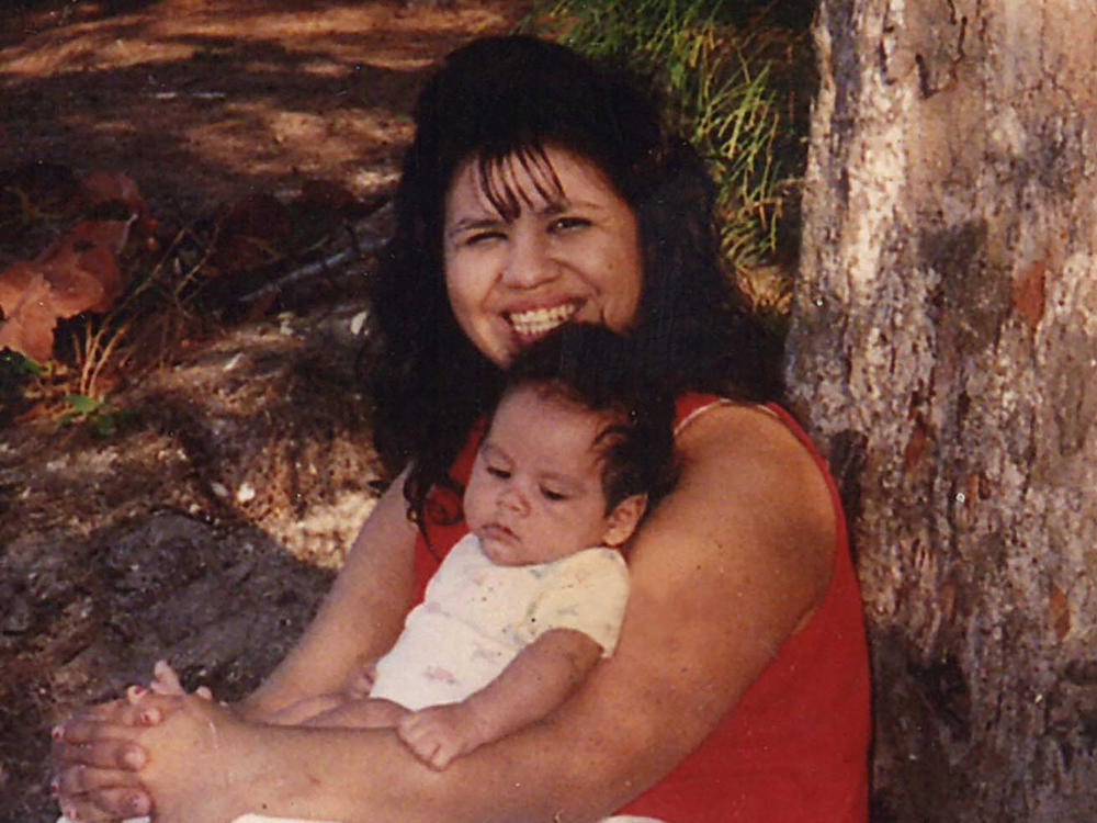 In this undated photograph, Texas death row inmate Melissa Lucio is holding one of her sons, John. Lucio is set to be executed on April 27 for the 2007 death of her 2-year-old daughter Mariah.