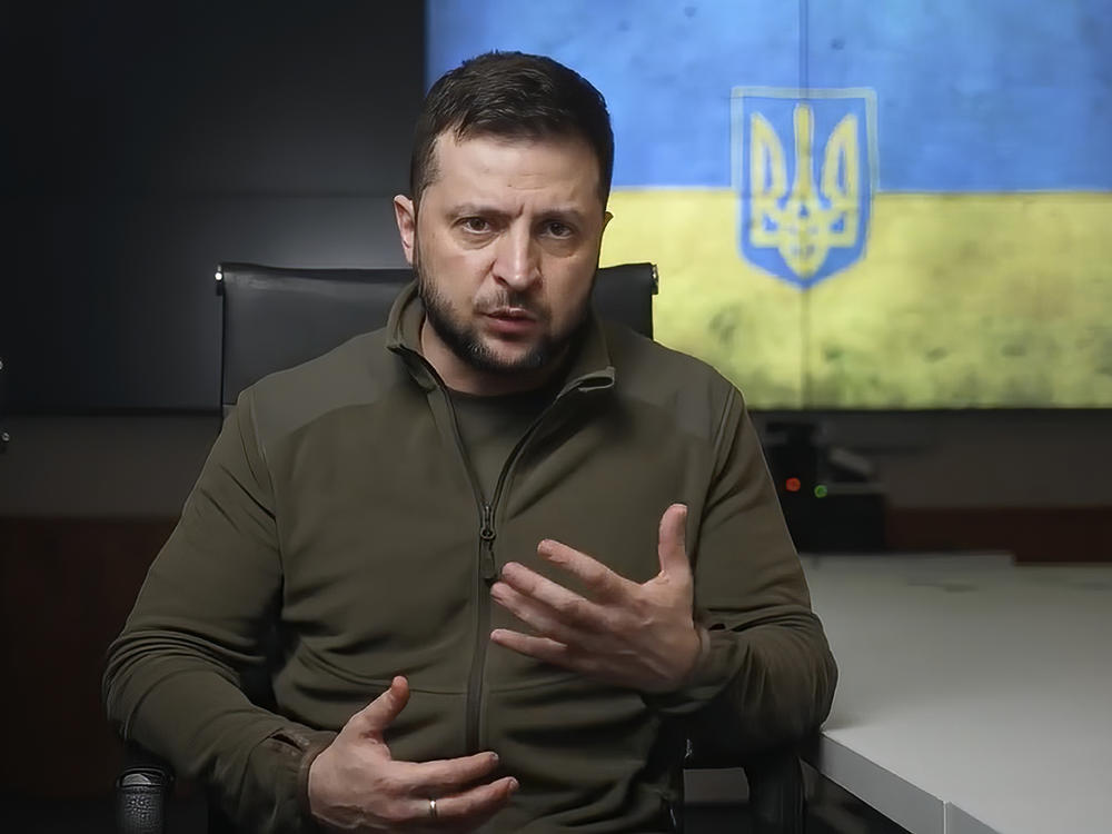 Ukrainian President Volodymyr Zelenskyy is seen speaking from Kyiv in a pre-taped video presented at the Grammy Awards on Sunday.