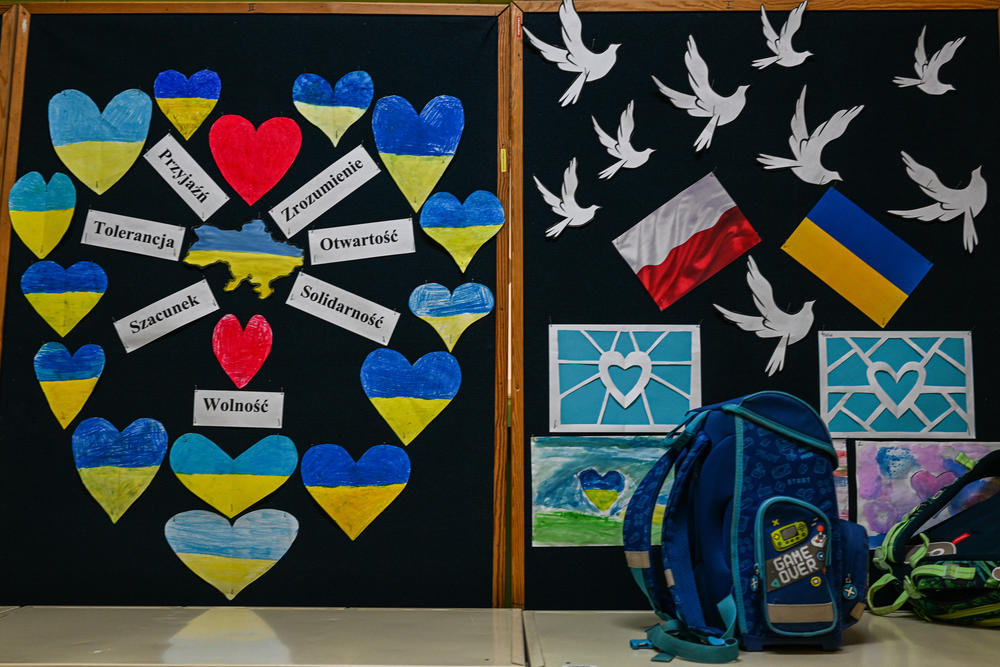 Boards with hearts and Ukrainian and Polish flags showing solidarity with children who fled the war in Ukraine are seen inside a primary school classroom in Krakow, Poland.
