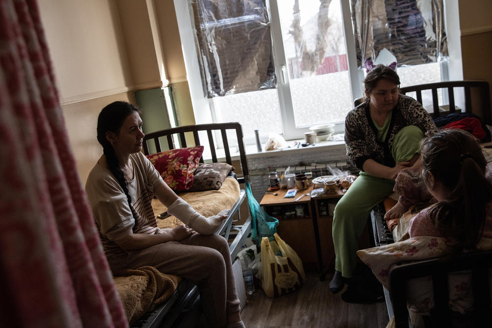 <strong>April 2:</strong> Yulia Dyrda (left) Victoria Pinul (center) and Alina Shchegulets (right), who were injured from Russian shelling, recover at a hospital in Chuhuiv, near Kharkiv in northeast Ukraine.