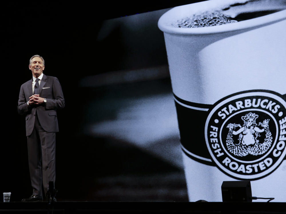 Starbucks Executive Chairman Howard Schultz, seen at a shareholder meeting in 2018, returned to Starbucks as interim CEO on Monday.