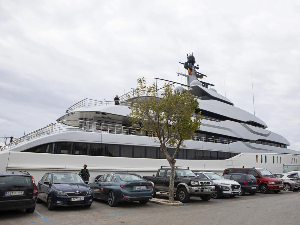 A Civil Guard stands by the yacht called Tango in Palma de Mallorca, Spain, on Monday. U.S. federal agents and Spain's Civil Guard are searching the yacht owned by a Russian oligarch.