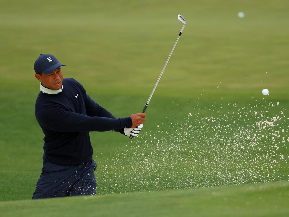 Tiger Woods warms up during a practice round prior to the Masters at Augusta National Golf Club on Tuesday in Augusta, Ga.