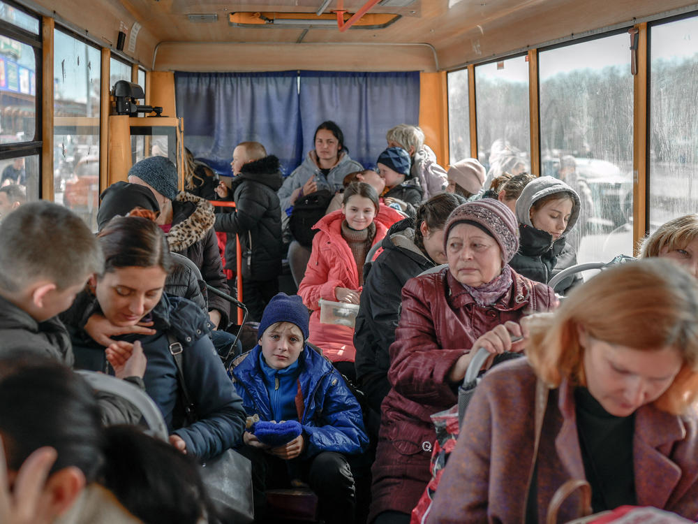 Internally displaced people arrive at a center in Zaporizhzhia, northwest of Mariupol, on Wednesday.