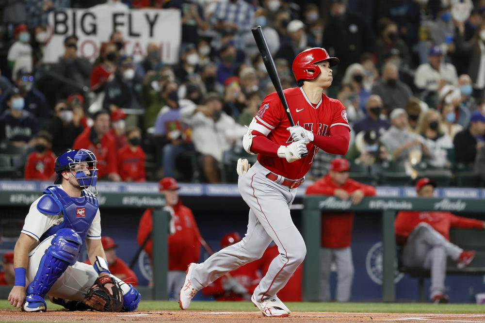 Los Angeles Angels pitcher Shohei Ohtani watches his home run against the Seattle Mariners on Oct. 3, 2021, in Seattle.