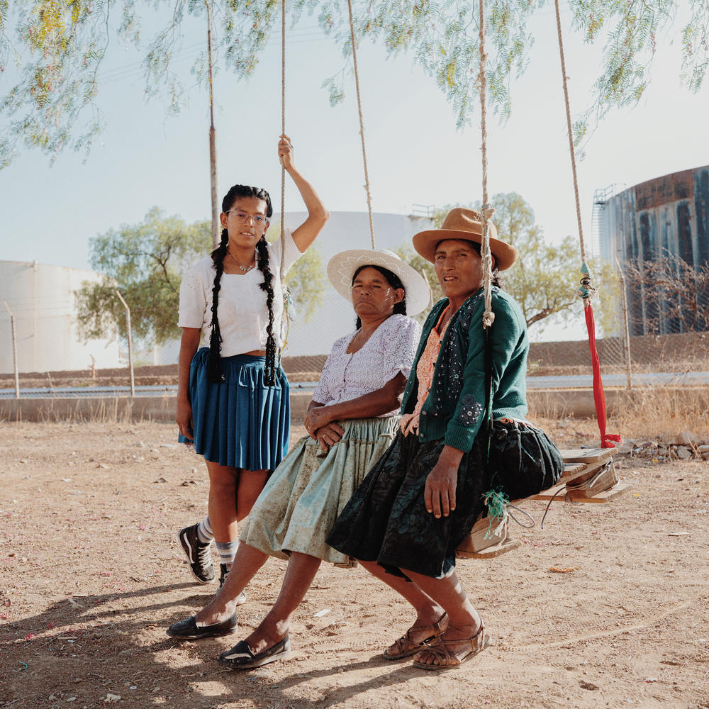 Deysi Tacuri Lopez, her mother and her aunt at their home in Cochabamba. 