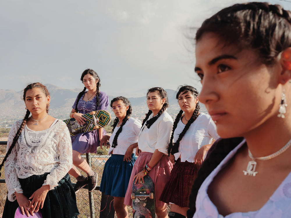 Members of the all-female skate crew ImillaSkate in Cochabamba, Bolivia. The athletes wear <em>polleras</em>,<em> </em>skirts traditionally worn by Bolivia's Indigenous Aymara and Quechua women, when they skate at tournaments. 