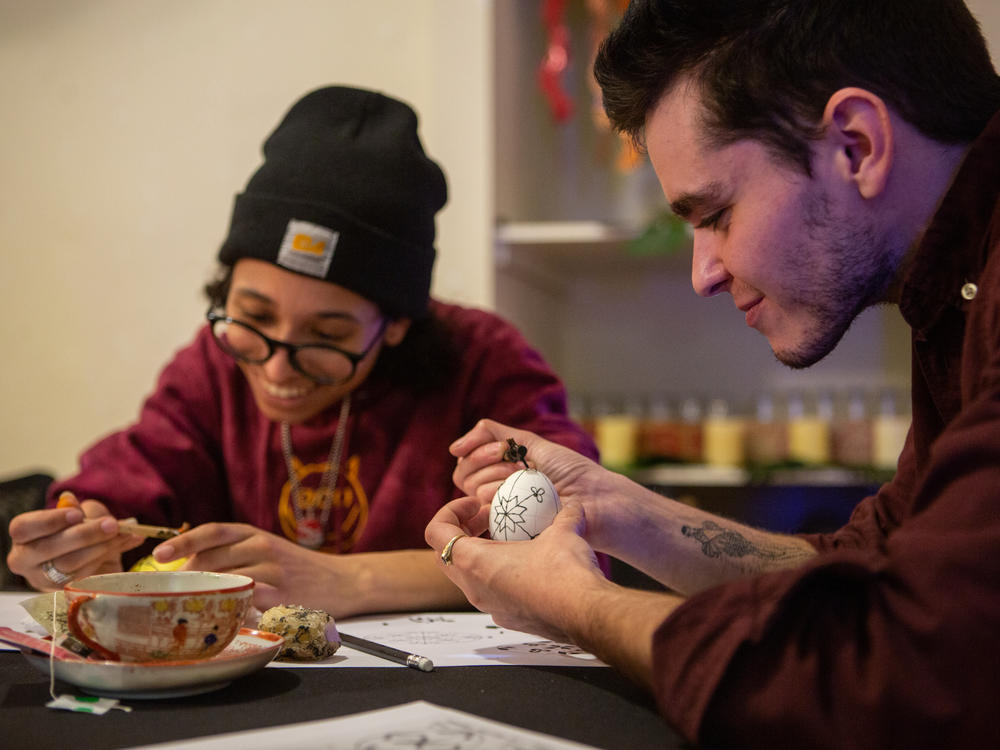 Workshop participants learn to create <em>pysanky</em>, or Ukrainian-style decorated eggs, at a workshop in Troy, N.Y. on Mar. 21.