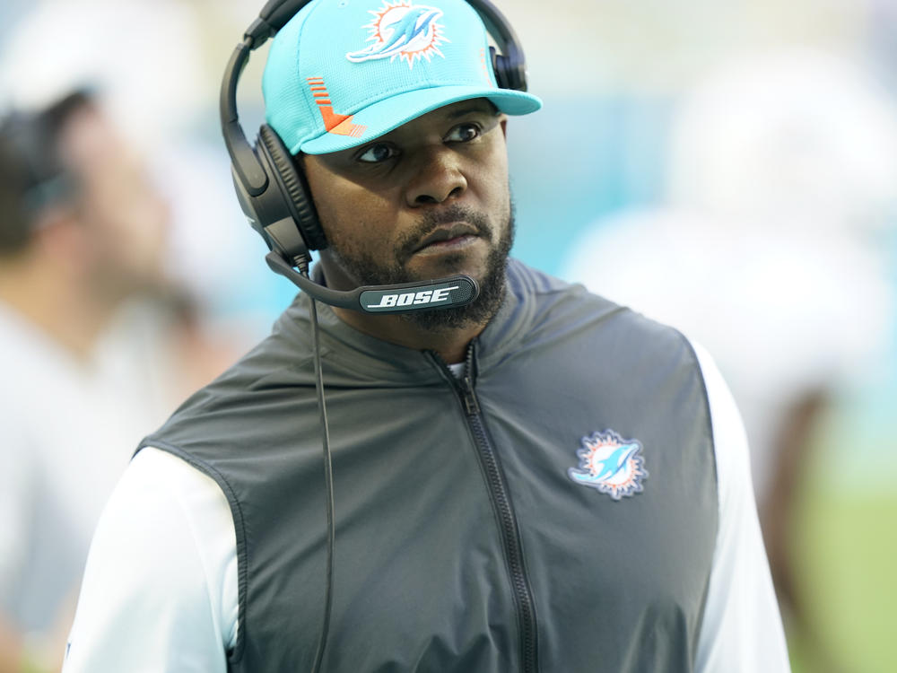 Miami Dolphins head coach Brian Flores watches a play during the first half of an NFL football game against the Carolina Panthers, Sunday, Nov. 28, 2021, in Miami Gardens, Fla.