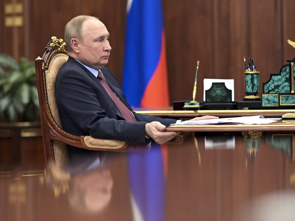 Russian President Vladimir Putin attends a meeting in the Kremlin in Moscow, on Wednesday.