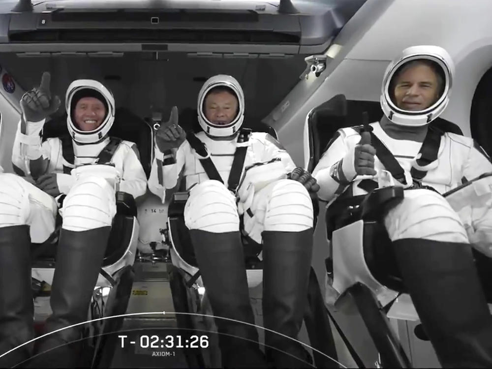 The SpaceX crew is seated in the Dragon spacecraft on Friday, in Cape Canaveral, Fla., before their launch to the International Space Station.