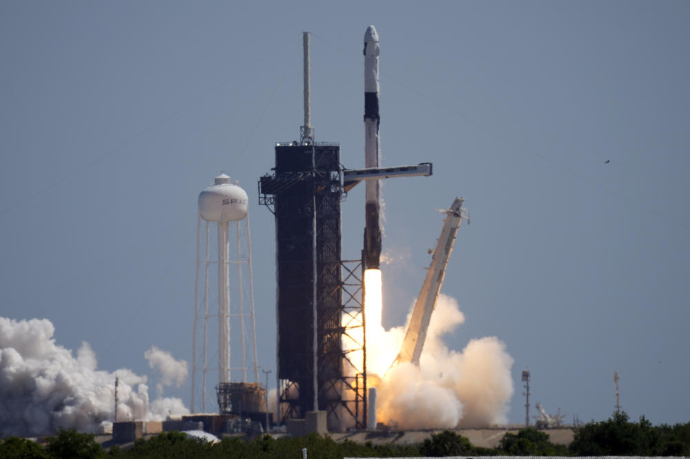 A SpaceX Falcon 9 rocket, with the Crew Dragon capsule attached, lifts off Friday at the Kennedy Space Center.