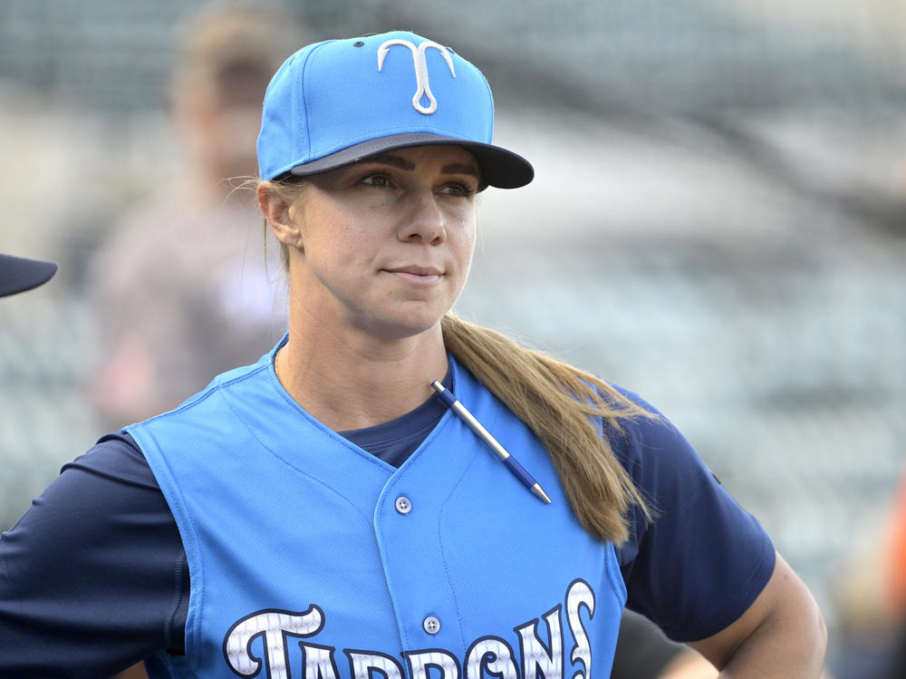 Tampa Tarpons manager Rachel Balkovec watches from the top steps of the dugout, while making her debut as a minor league manager of the Tampa Tarpons on Friday in Lakeland, Fla.