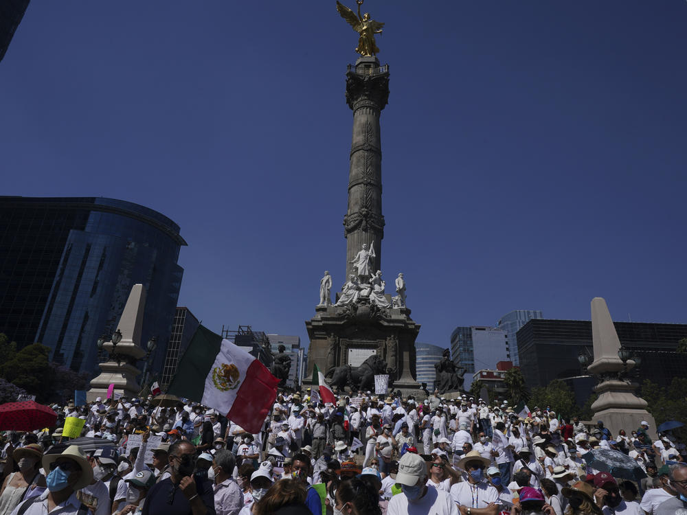 Opposition members gather at the Angel of Independence monument, encouraging citizens not to vote in the upcoming presidential recall referendum, as a protest against Mexico's President Andres Manuel Lopez Obrador, in Mexico City, Sunday, April 3, 2022.