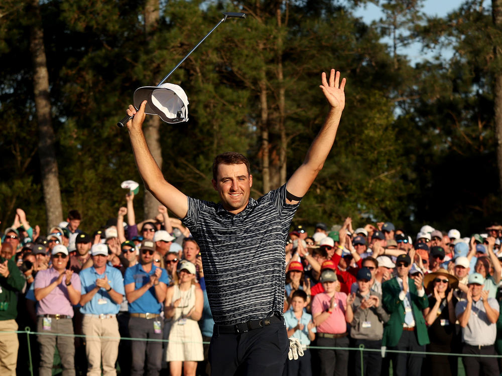 Scottie Scheffler celebrates winning the Masters at Augusta National Golf Club on Sunday in Augusta, Georgia.