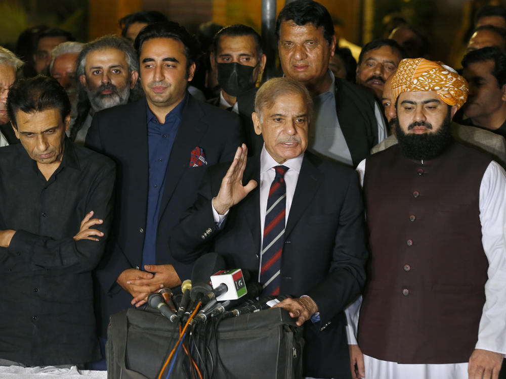 Pakistan's opposition leader Shahbaz Sharif, center, speaks while other opposition parties leader watch during a press conference after the Supreme Court decision, in Islamabad, Pakistan, on April 7, 2022.
