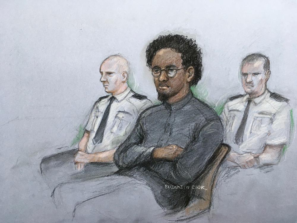This court artist sketch by Elizabeth Cook shows Ali Harbi Ali in the dock at the Old Bailey accused of stabbing to death David Amess, a Conservative member of Parliament, in London on March 21.
