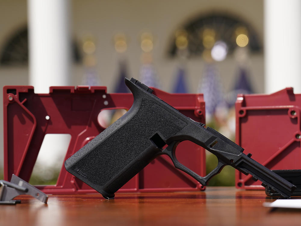A 9mm pistol build kit with a commercial slide and barrel with a polymer frame is displayed at the White House.
