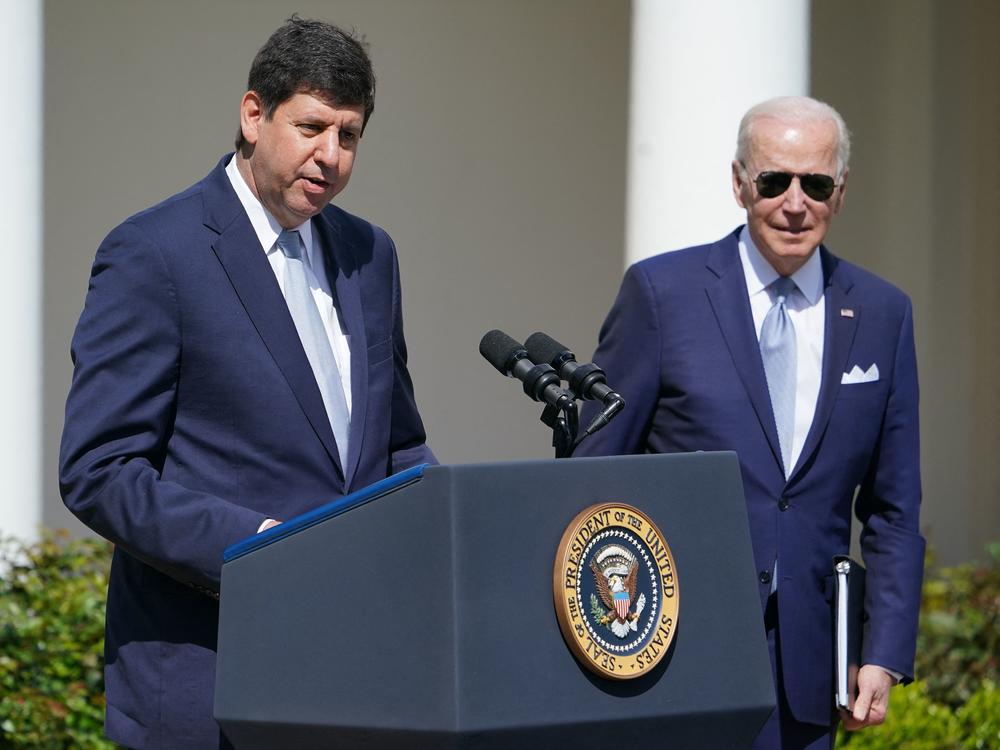 President Biden listens as Steve Dettelbach, nominee for director of the Bureau of Alcohol, Tobacco, Firearms and Explosives, speaks on measures to combat gun crime from the Rose Garden of the White House in Washington on April 11, 2022.
