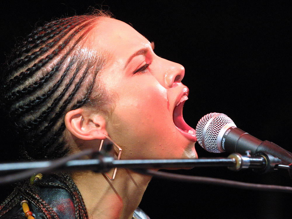Singer Alicia Keys performing at Madison Square Garden in New York City, a few months after the 9/11 attacks in 2001.