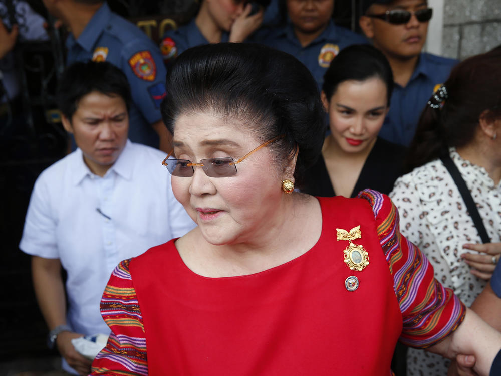 Imelda Marcos arrives at the Commission on Elections to lend support for her daughter Imee Marcos in filing her candidacy for a Senate seat in 2018 in Manila.