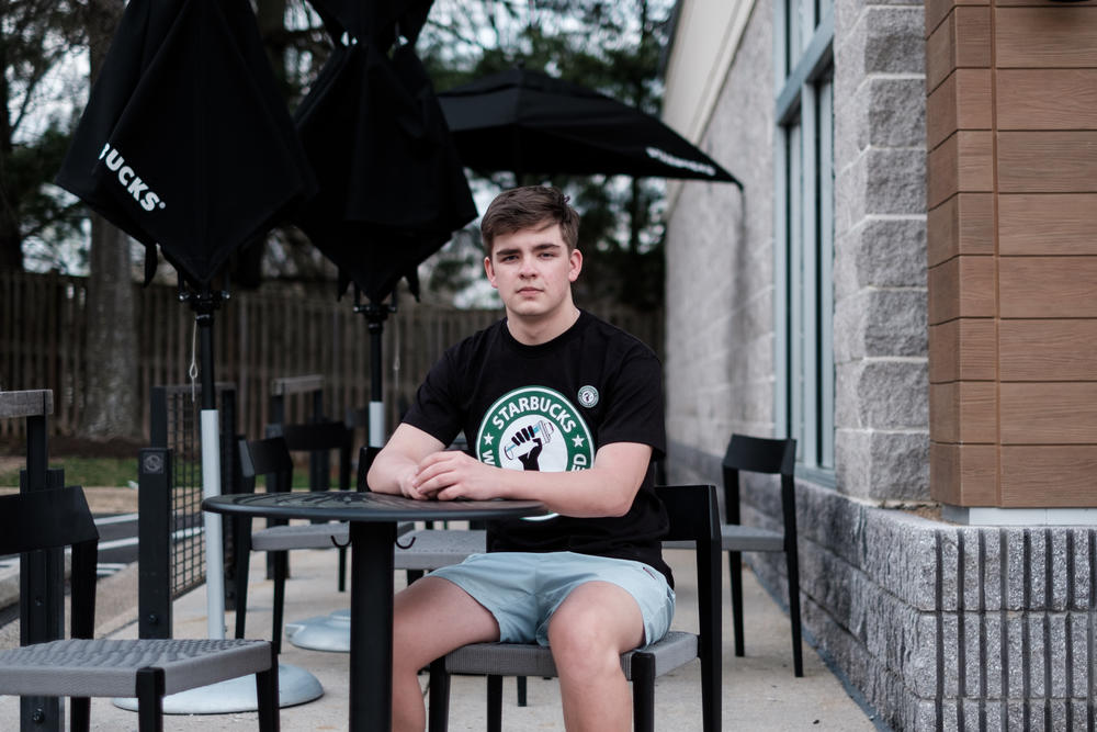 Starbucks barista Tim Swicord, a high school senior, became one of the organizers of his store's union campaign. Swicord joined Starbucks in the pandemic.