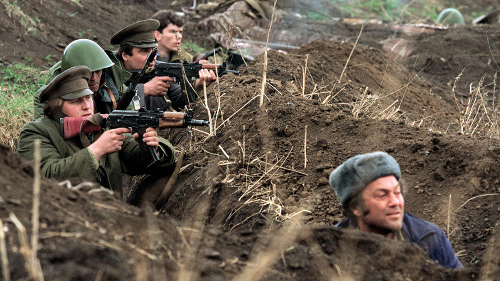 Fighters of the self-proclaimed Trans-Dniester republic take aim on March 30, 1992, near the village of Dubasari from their trenches toward Moldovan soldiers during clashes between Russian-backed separatists and Moldovan forces.