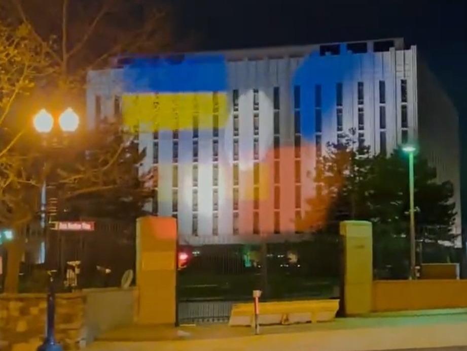 Benjamin Wittes and a group of demonstrators in Washington, D.C., teamed up to project two large Ukrainian flags against the Russian Embassy for nearly four hours Wednesday night.
