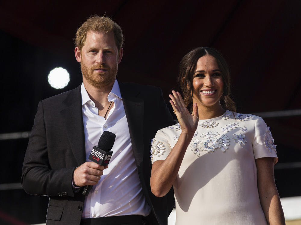 Prince Harry and his wife Meghan speak during the Global Citizen festival, on Sept. 25, 2021, in New York. The couple visited Queen Elizabeth II at Windsor Castle on Thursday.