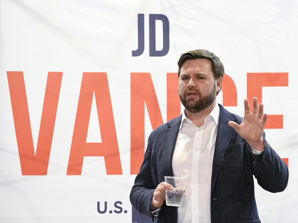 Republican U.S. Senate candidate J.D. Vance speaks with prospective voters on Monday in Troy, Ohio.