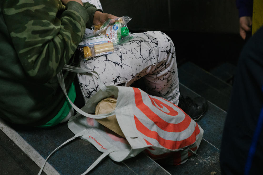 A homeless man on the Market-Frankford Line was given food by outreach services.