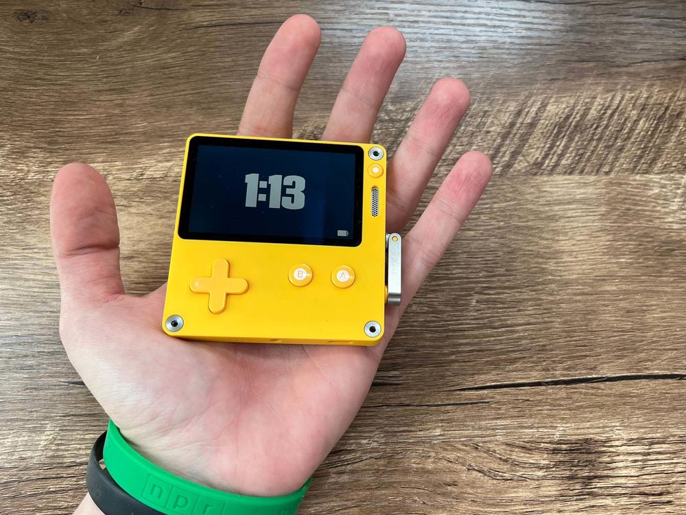 Bright and cheerful, the Playdate fits in the palm of your hand.