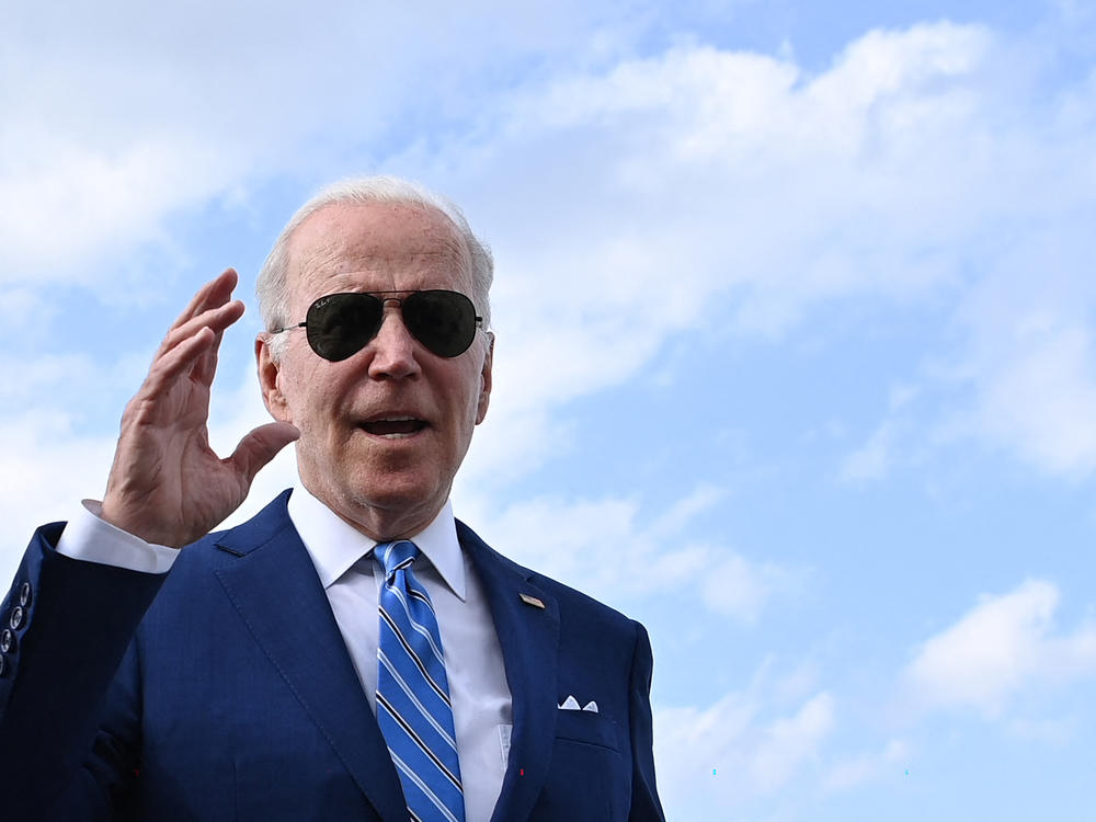 President Biden speaks to reporters prior to boarding Air Force One at Des Moines International Airport in Des Moines, Iowa, on April 12.