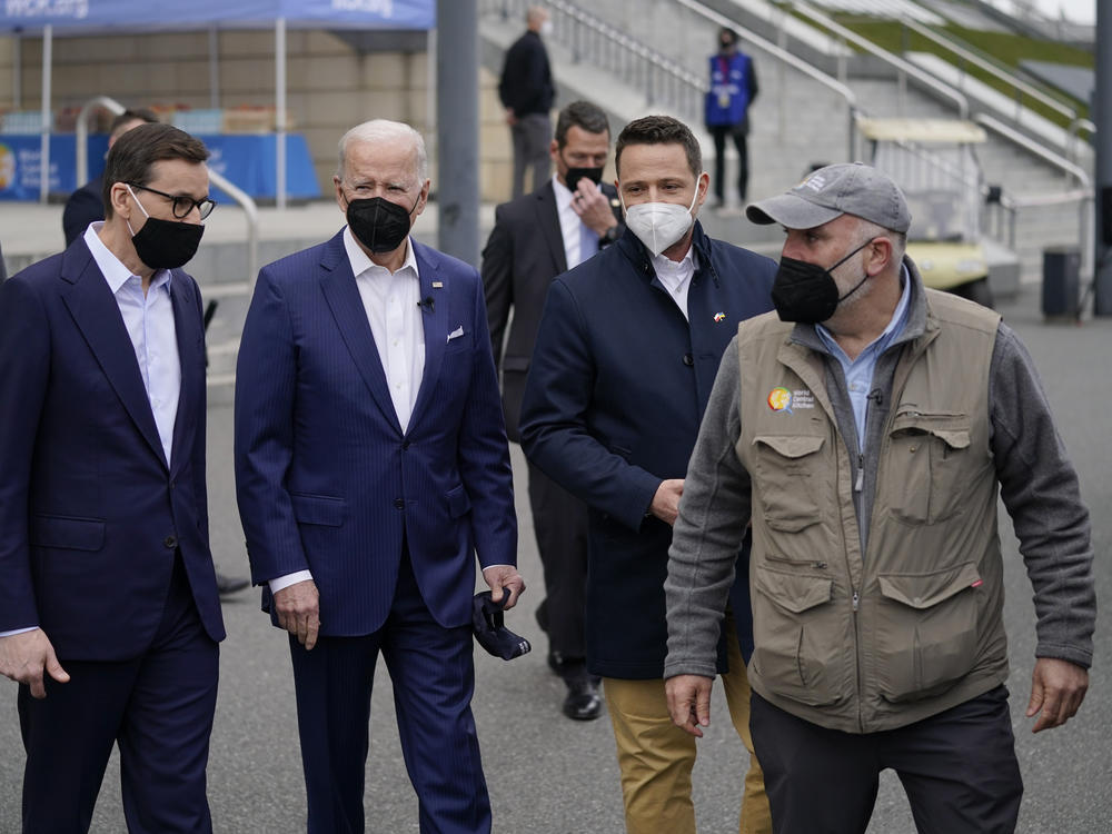 Celebrity chef José Andrés (right) is the founder of World Central Kitchen, a nonprofit organization that serves meals to people affected by humanitarian crises. Here, President Biden (second from left) arrives to meet with Ukrainian refugees and humanitarian aid workers during a visit to Warsaw, Poland, on March 26.