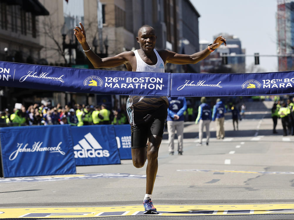 Evans Chebet, of Kenya, hits the finish line to win the 126th Boston Marathon on Monday.