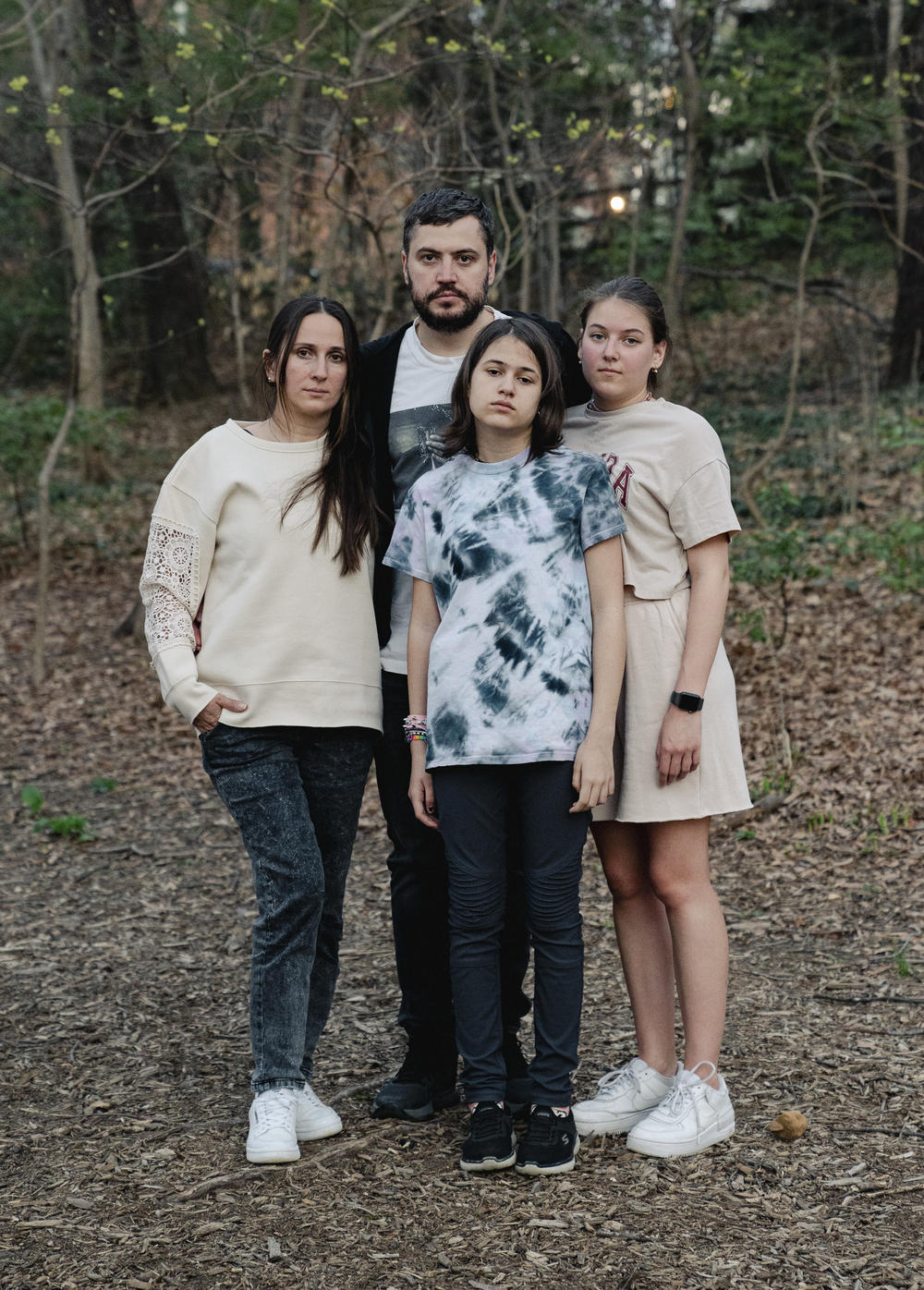 The Koliubaiev family stands for a portrait in Penrose Park in Arlington, Va., on April 12.