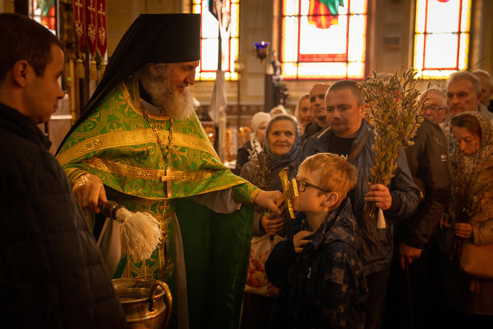 <strong>April 17: </strong>People attend a Palm Sunday church service at a church in Kharkiv, Ukraine.