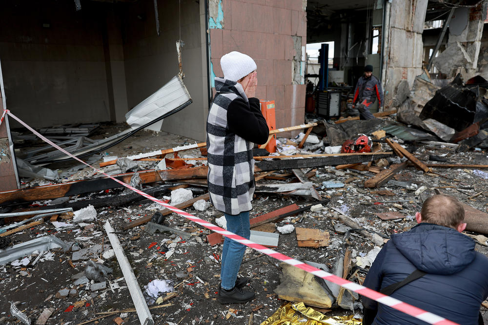 <strong>April 18:</strong> A woman reacts as she looks on at the destruction caused when a civilian building was hit by a Russian missile in Lviv, Ukraine.