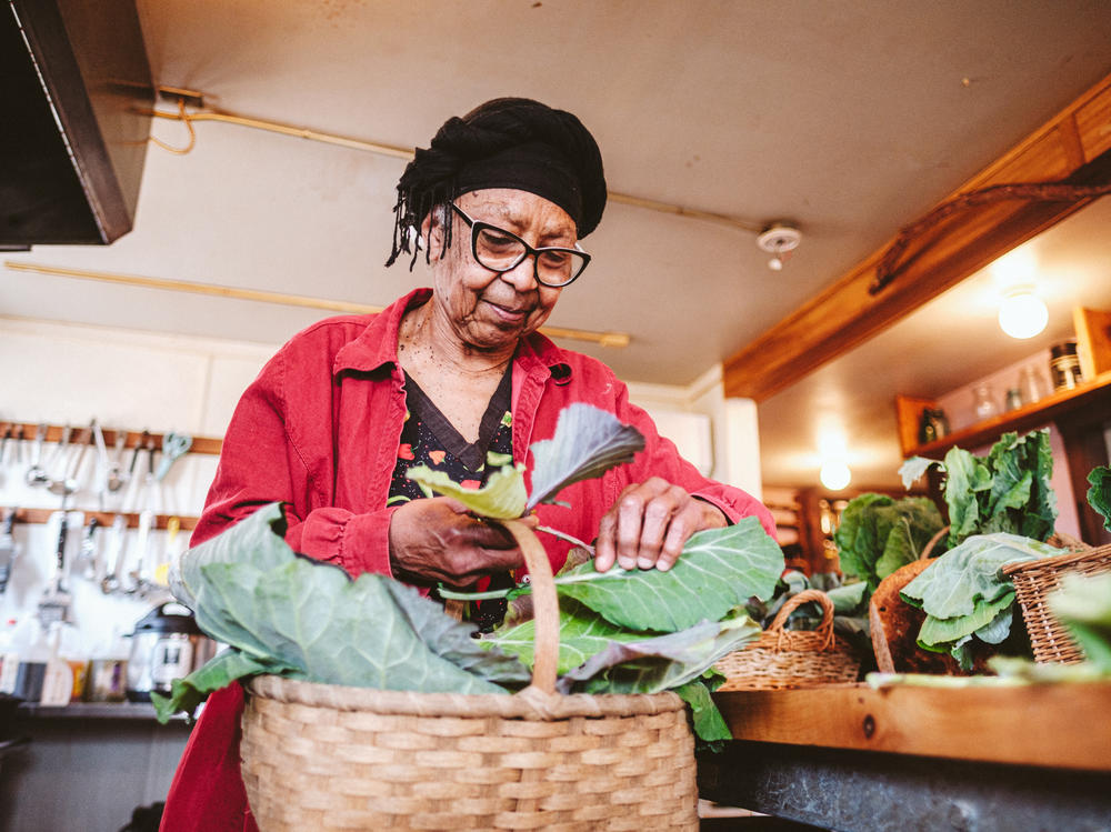 Ira Wallace talks about collard greens at Acorn Community Farm in Mineral, Va. 